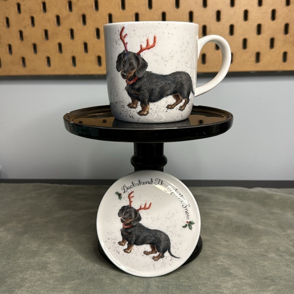 Royal Worcester Dachshund through the Snow mug coaster set